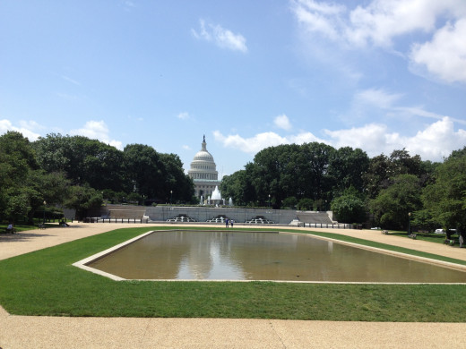 LOOKING EAST FROM OUR BUS OVER THE CAPITOL BUILDING REFLECTING POOL