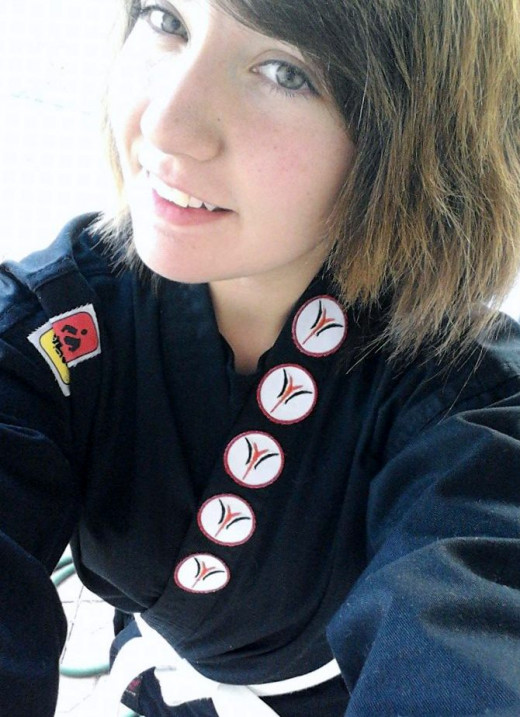 Lily - Sophomore in High School. She found a new passion - Karate! Now a purple belt!