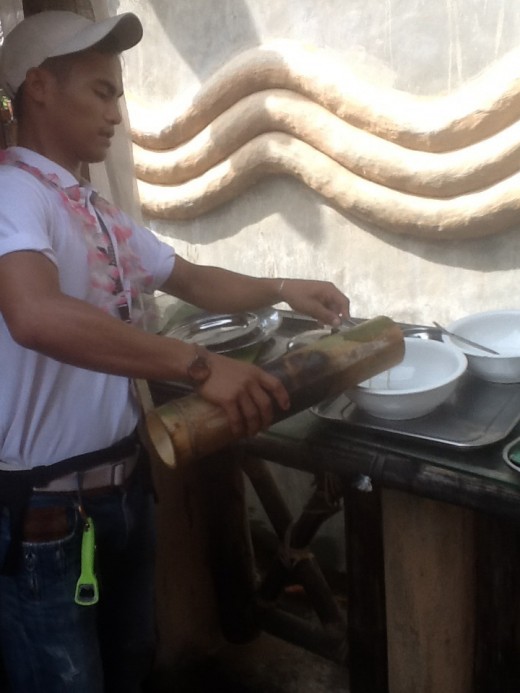 Pouring the Tinola at the bowl