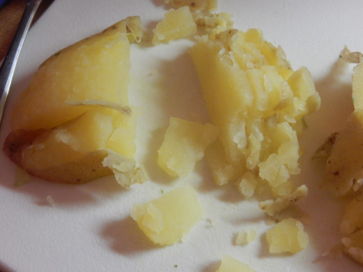 Potato being cut into bite-size pieces.  Photo by JenPaxton