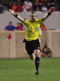 American Mark Geiger Was in Brazil's World Cup of Futbol/Soccer Without Wearing Red, White and Blue - and Russia's Too