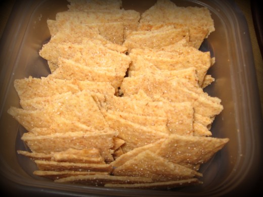 Stack cooled crackers into a resealable container and keep sealed until ready to eat.  It is best to keep the crackers stacked so they do not break as easily.  Just a tip!