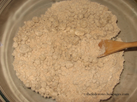 Crumbles start to form as the dough begins to clump together.  