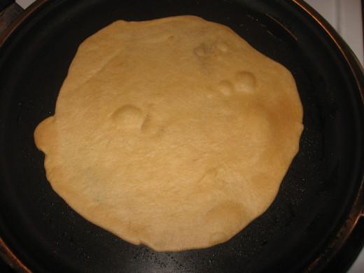 Heat on skillet for 30-45 seconds (35 seconds is ideal). Bubbles will form.  