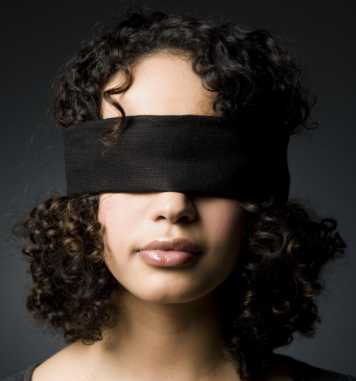A woman in blindfold