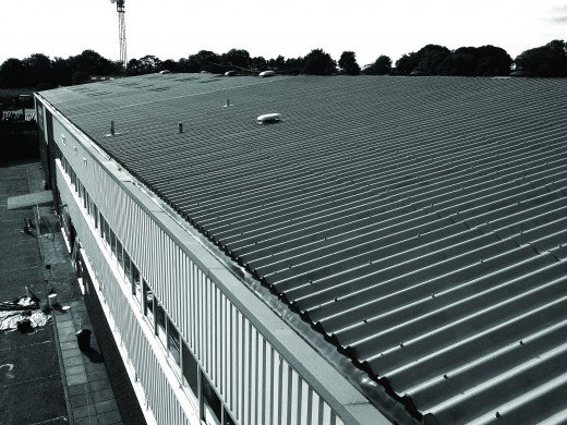 A corrugated asbestos roof that has been encapsulated in a rubber coating