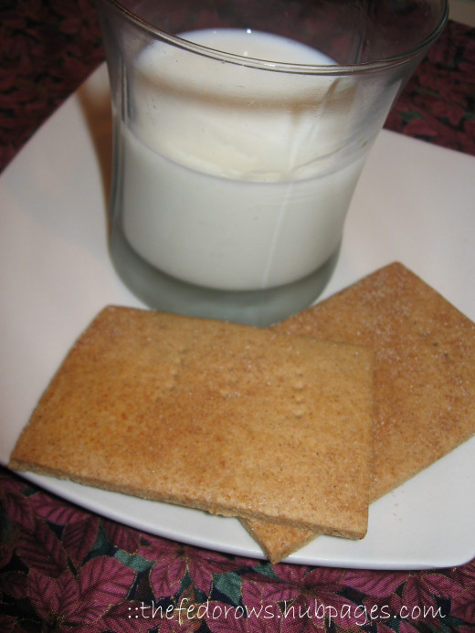 Homemade Honey-Cinnamon Whole Wheat Graham Crackers are perfect with a glass of milk.  