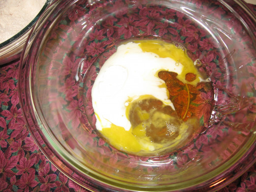 3. In another bowl, lightly beat the egg, then add in the wet ingredients (oil, egg, honey, milk).  