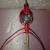 Tie 3 square knots, then add a bead. Tie 3 square knots, then add a bead.