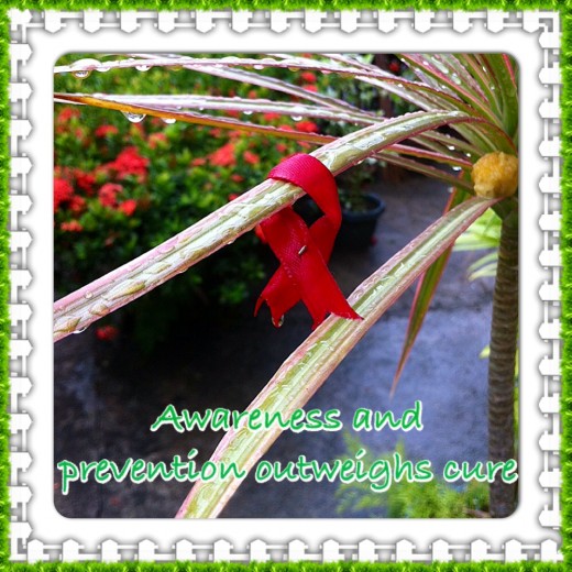 Red ribbon signifies awareness for HIV infection