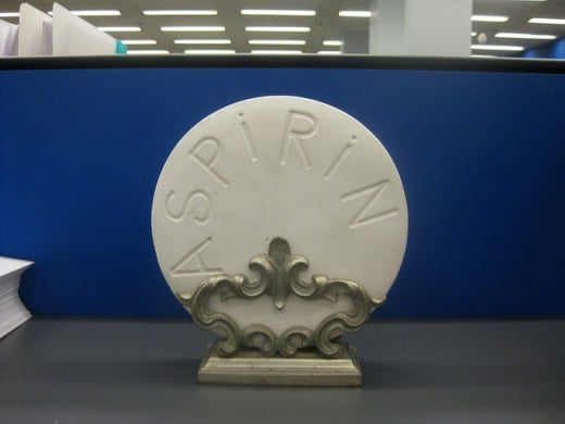 A giant aspirin tablet on display.