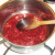 Raspberry, whisky and honey sauce is simmered to reduce and thicken