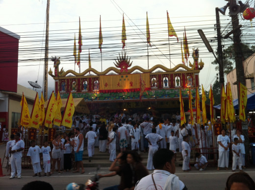 People gathering around Ahm from early morning to witness piercing ceremony and to participate in the parade afterwards in the Vegetarian Festival