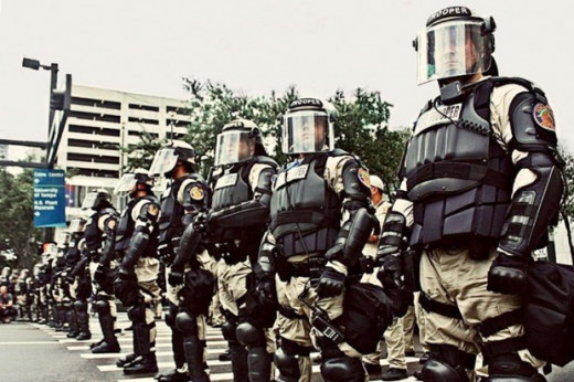 This isn't a Military Police squad in Iraq. This is a militarized police SWAT Team and they are growing in the United States.