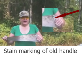 Use the old stain mark of the old handle on the old saw blade as a pattern to  form the extension of the handgrip made from the yellow hacksaw handle. 