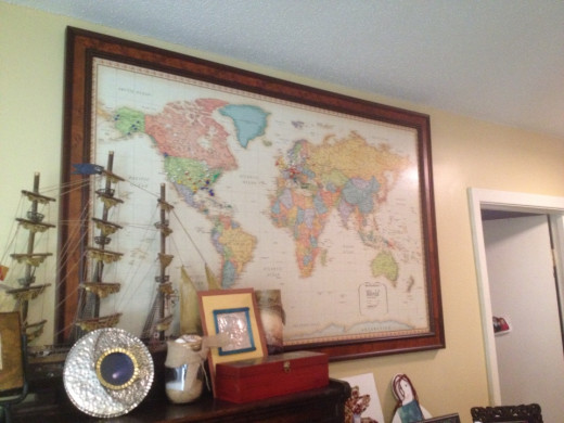 The travel map hanging in our home.