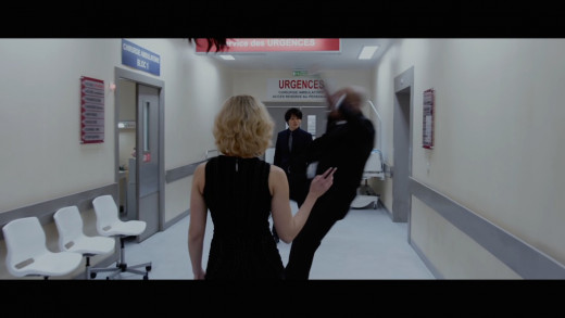 Lucy air lifts and throws a man away with her super brain powers...