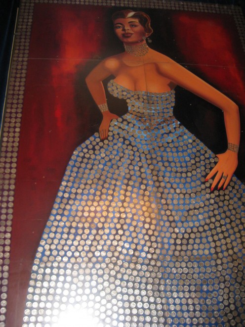 Silver Queen - Her dress is made from 3,261 "Morgan" silver dollars minted in Carson City. 