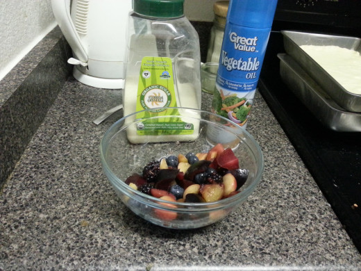 Mix the cut up fruit with the sugar.