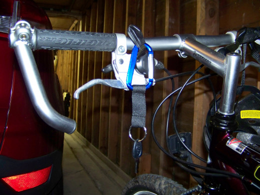 I attached the key of my Key Cable Lock to a carabinger key chain.  