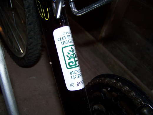 Bicycle tag affixed to the frame of my bicycle from when I lived in the city. 