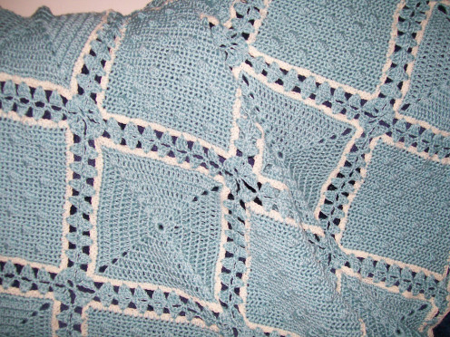 Used Smooth and Bobble squares from the pattern, and all the same color except for an extra round of single crochet with off-white yarn for the edges on each square.
