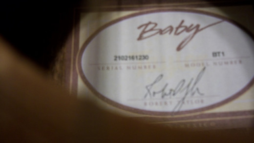 This photo shows the model number of the Baby Taylor, and the serial number.