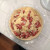 Pour the contents of the bowl onto the pie crust. Pour the contents of the bowl onto the pie crust.