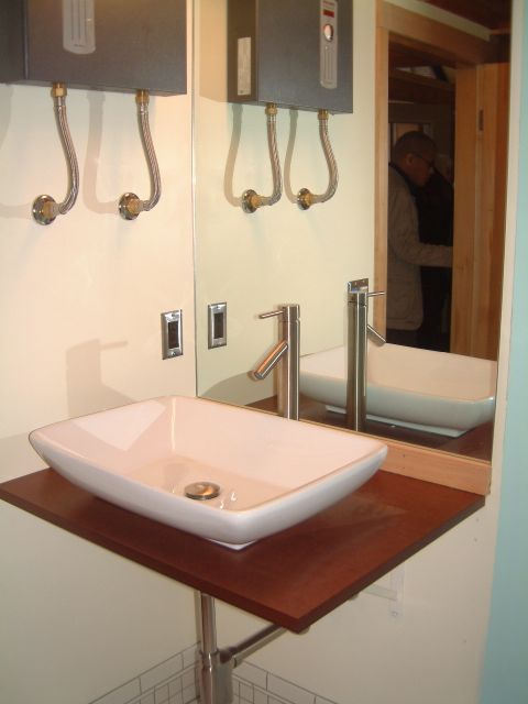 Inside the bathroom, this is the sink across from the shower.