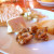 Nuts, sometimes spiced or glazed, are popular sides to go with a cheese assortment. Nuts, sometimes spiced or glazed, are popular sides to go with a cheese assortment.