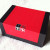 Under the presentation sleeve, there is a smart red and black box Under the presentation sleeve, there is a smart red and black box