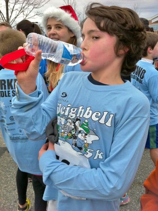 Water is the best choice to replenish lost fluids after physical exertion. After a 5K, water is provided for all runners.