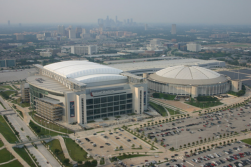 The Astrodome next to Reliant Stadium, where the Houston Texans now hold their games. The Astrodome next to Reliant Stadium, where the Houston Texans now hold their games.