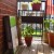 One shelf assembled and next to the rail.  Testing the sizes of my planters.