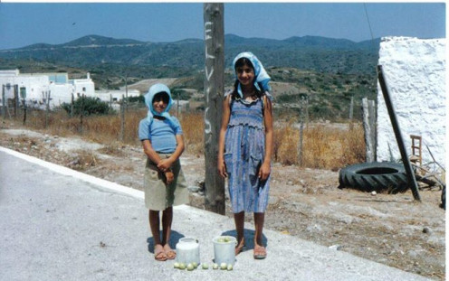 Young village girls picking figs.
