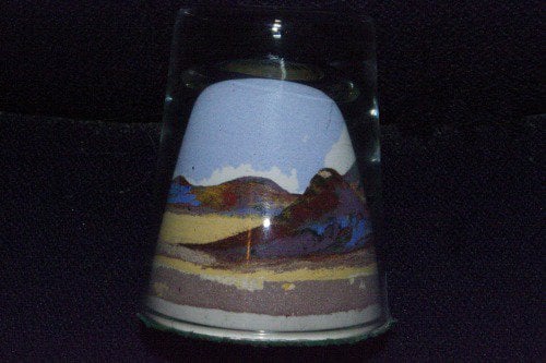Sand painting in glass made by a Native American.