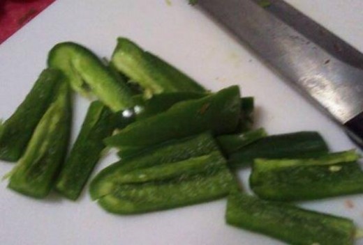 Green chilies sliced lengthwise.