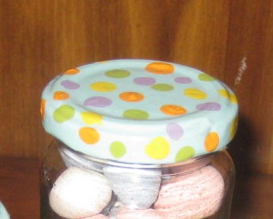 As a final step, I added a coat of sealant (I used Mod Podge but any water-based sealer will work) to protect the paint and give it a little shine. Add a second coat if desired. Let dry then fill the jars and reseal with the painted lid!