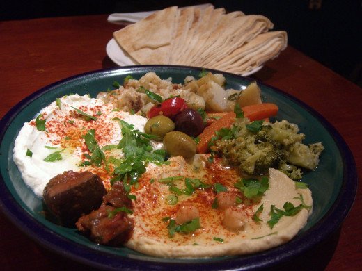 Hummus; a paste consists of garlic, chickpeas, olive, lemon juice and salt. Famous in all of the Arab world.