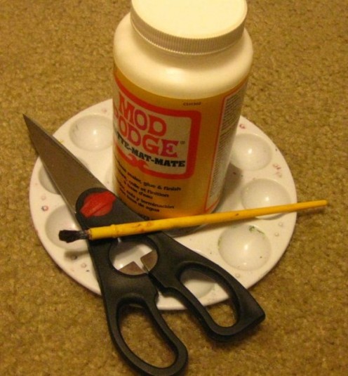 Supplies needed:  scissors, decoupage medium, paintbrush.