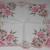 White handkerchief with carnation flowers printed on the hankie. White handkerchief with carnation flowers printed on the hankie.
