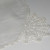 White on white, fan corner embroidery. White on white, fan corner embroidery.