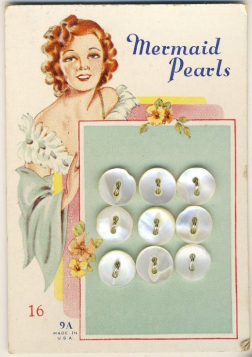Mermaid Pearls buttons and card. Courtesy of Gathering Dust. http://bethleintz.typepad.com/gathering_dust/2011/08/button-card-collecting.html
