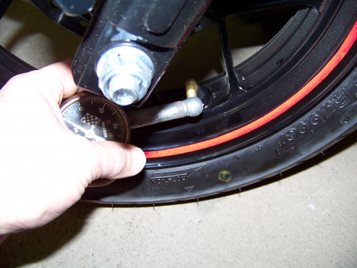 It is important to keep the tires at the specified tire pressure. Do not over inflate the tires! Tire pressure is specified on rear swing arm sticker.