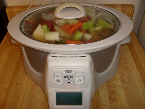 Brisket, a few potatoes, carrots, celery, broth to cover & 3 bay leaves as the added "yum". Didn't have cabbage handy - Keep it simple Brisket, a few potatoes, carrots, celery, broth to cover & 3 bay leaves as the added "yum". Didn't have cabbage handy - Keep it simple