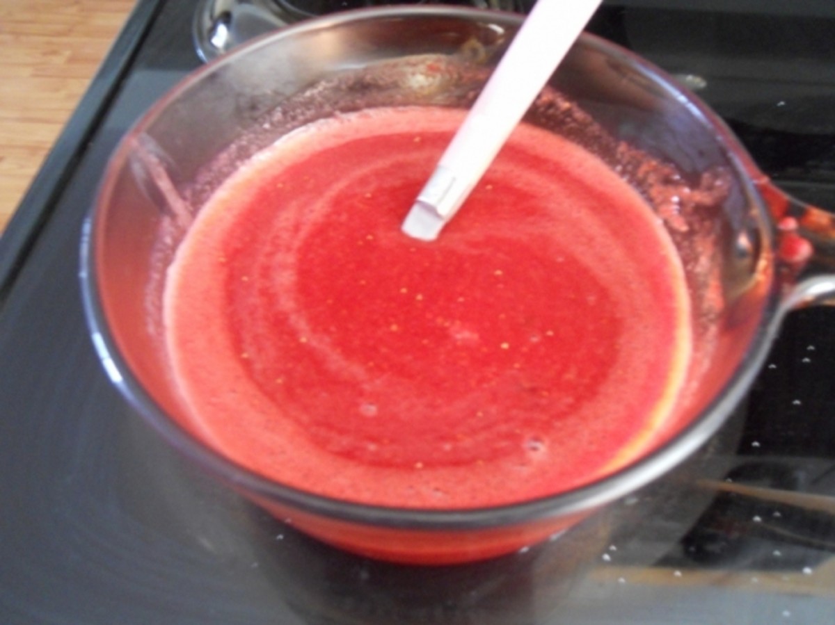 The blended berries and 1/2 cup of sugar were put in a pot and brought to a boil.   Stirring constantly.  Then, the cornstarch and 1/2 cup berry juice were stirred in and it was simmered until thick.