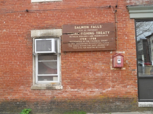 Information on the Indian Fishing Treaty on the side of a building on the corner of Deerfield Avenue and Bridge Street.
