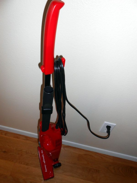 The cord is a generous 16 feet long and wraps neatly away when not in use. The crevice tool conveniently attaches to the handle.