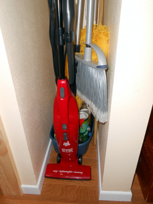 It's spacious! This handy vacuum fits into a tiny 11" wide cleaning closet. :)
