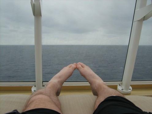 Steve took most of the pictures on the cruise, so you'll see me in most of them, but here's one of his feet on the big wicker chair overlooking the front of the ship with the Atlantic Ocean in the background. 